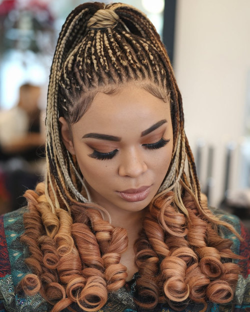 knotless braids with curls.png